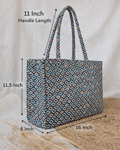 Patterned tote bag with measurements on a neutral background